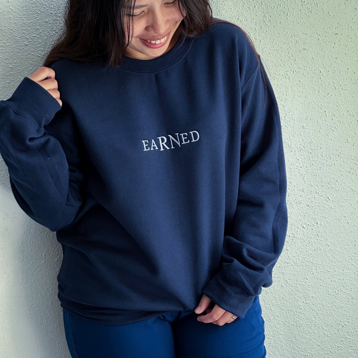 eaRNed Sweatshirt (Embroidered) - NurseStrong